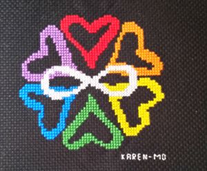 six colored hearts surrounding a white infinity symbol